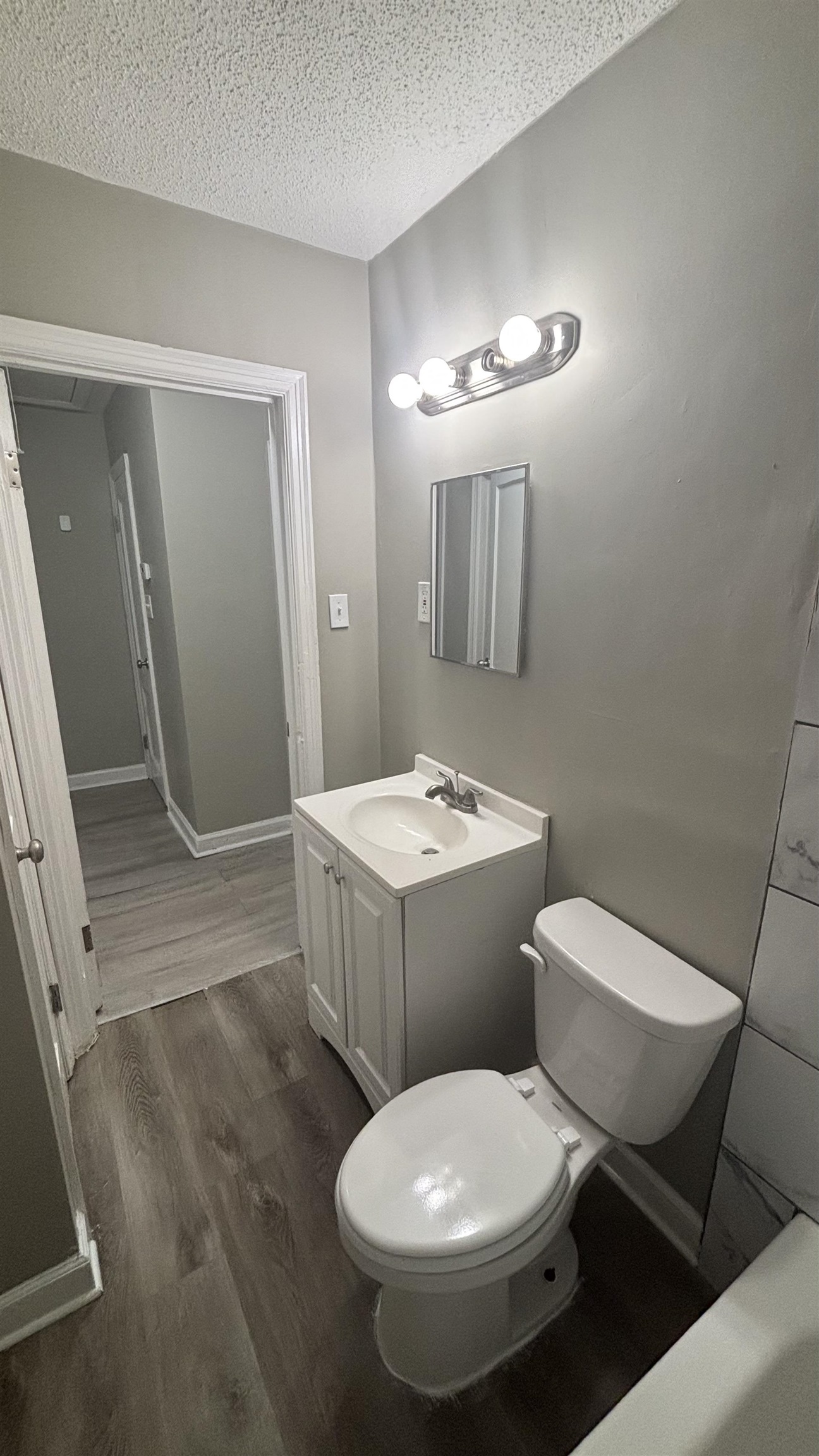 3133 Benjestown Road Memphis, TN 38127 - Photo 16 of 17 a bathroom with a toilet sink and mirror