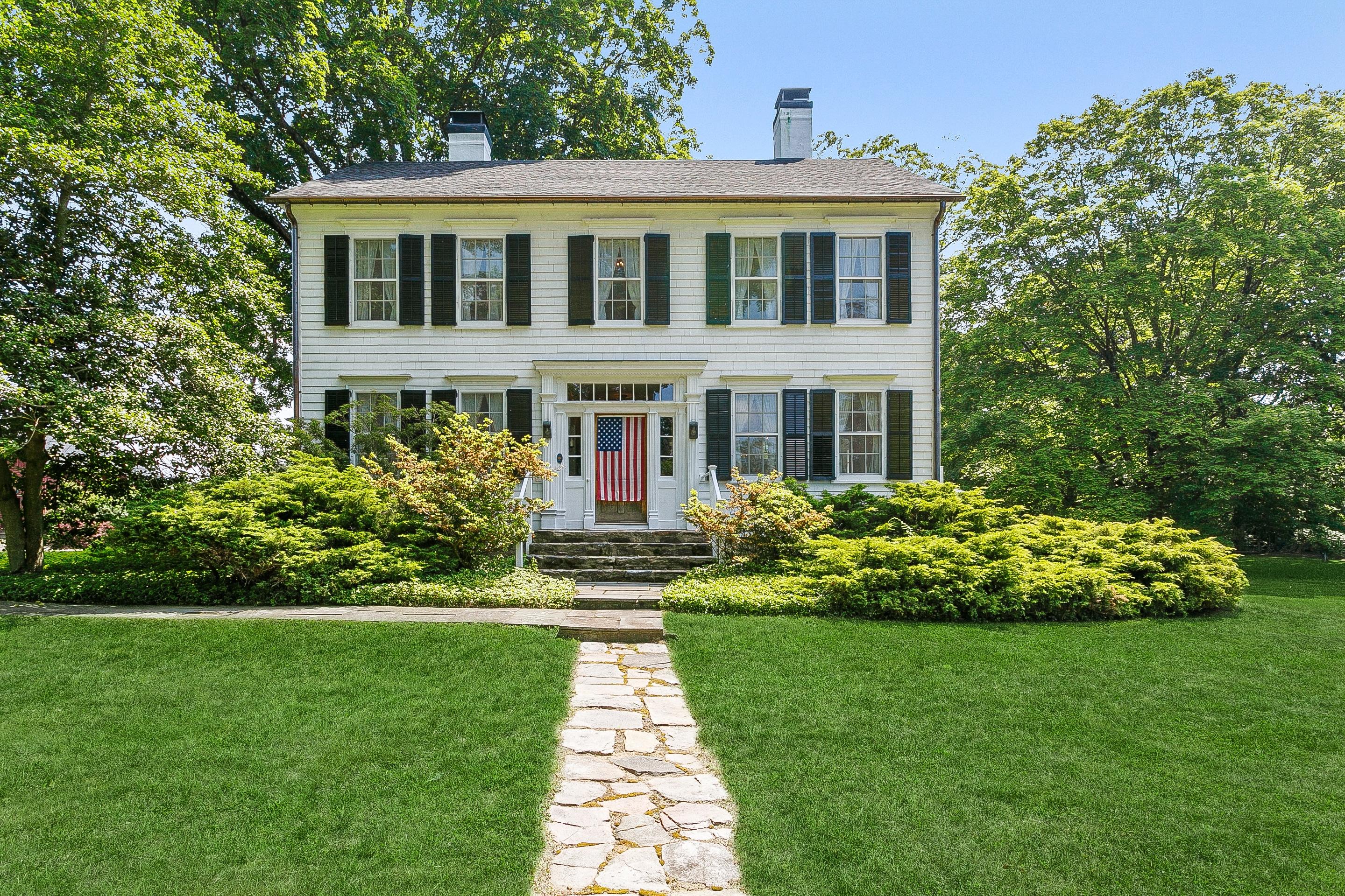 4 Lonetown Road Redding, CT 06896 - Photo 1 of 1 a front view of a house with a garden