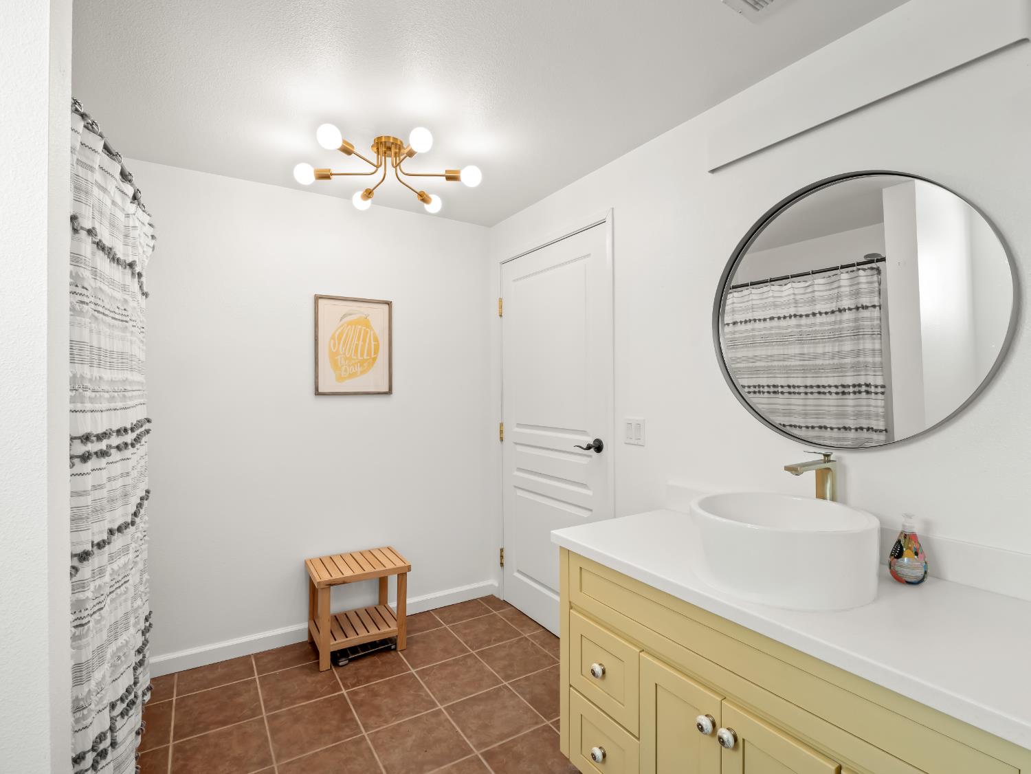 17113 Mark Road Madera, CA 93636 - Photo 83 of 99 a bathroom with a sink mirror and vanity