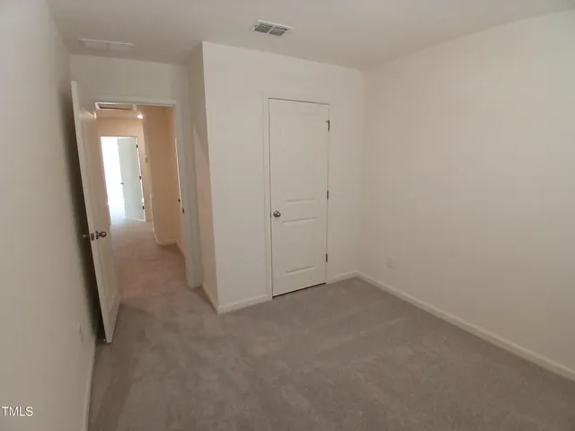 an empty room with an entryway