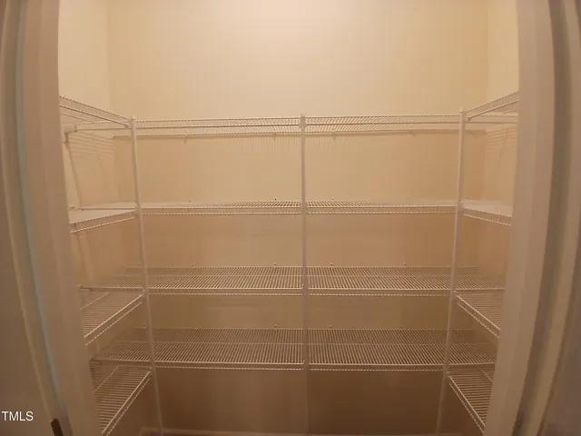 a bathroom with a shower and a window