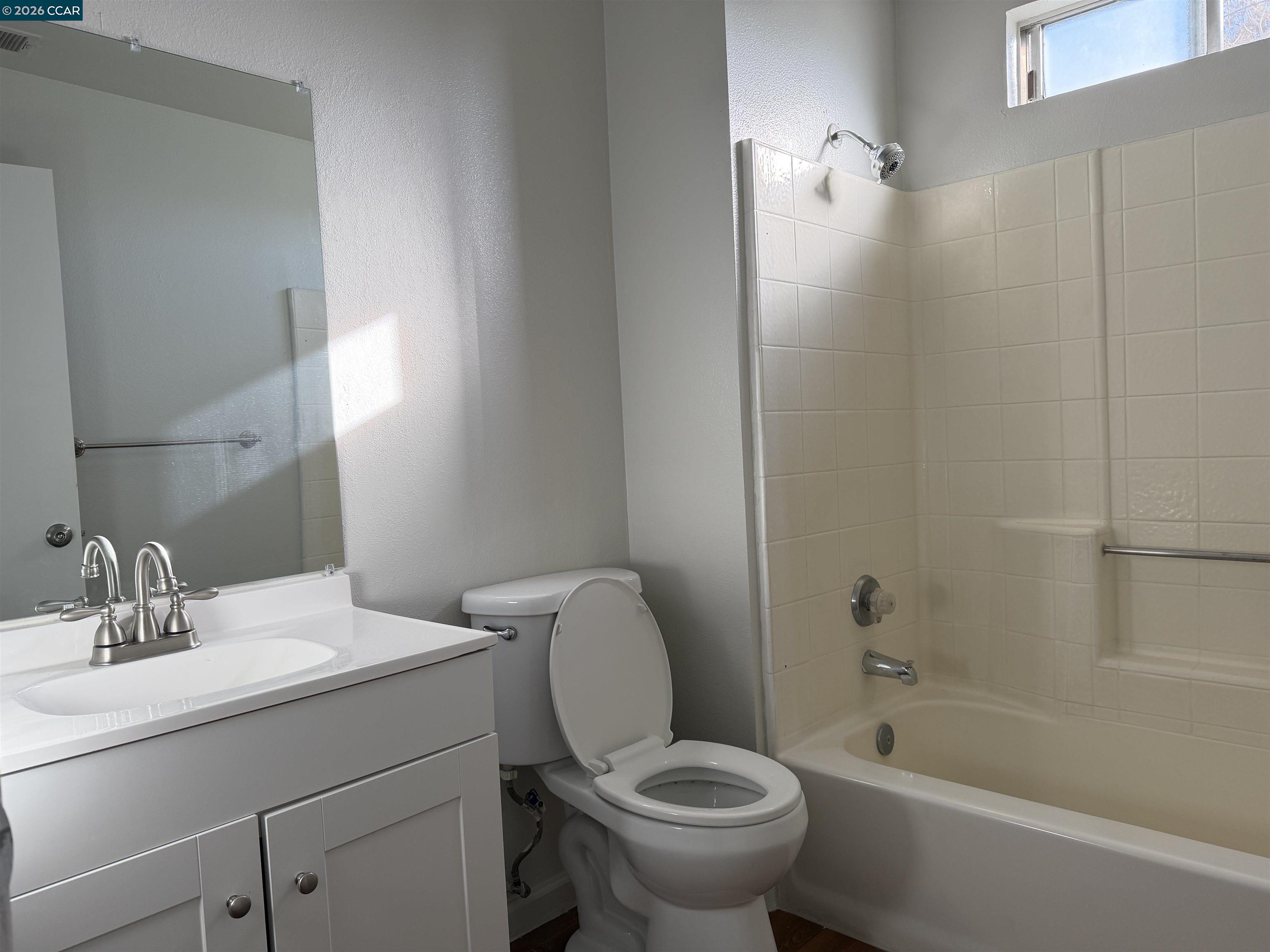 2510 Peppertree Drive Merced, CA 95348 - Photo 11 of 15 a bathroom with a sink toilet and shower