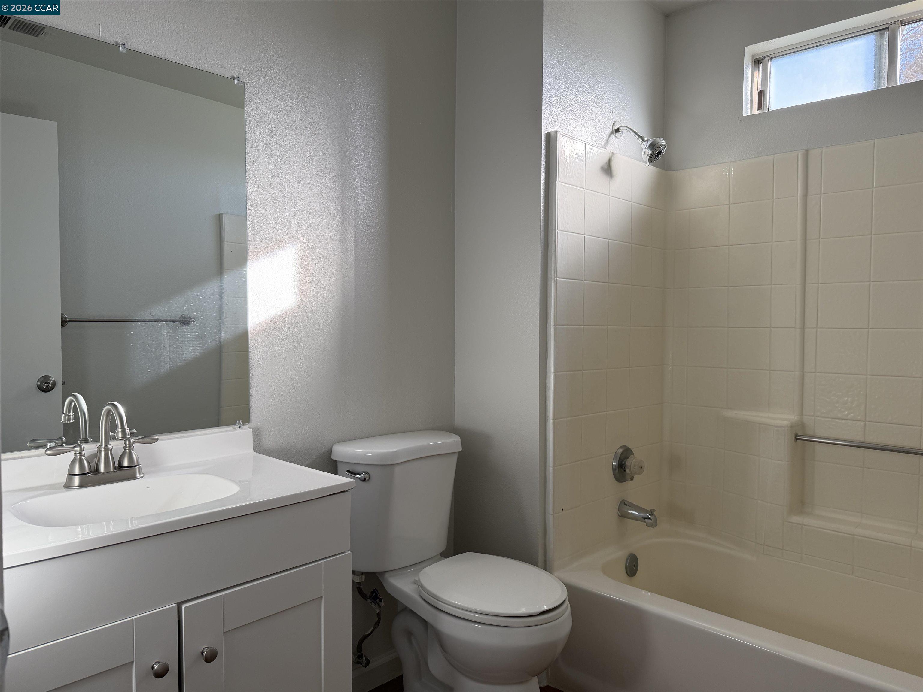 2510 Peppertree Drive Merced, CA 95348 - Photo 13 of 15 a bathroom with a sink toilet and shower