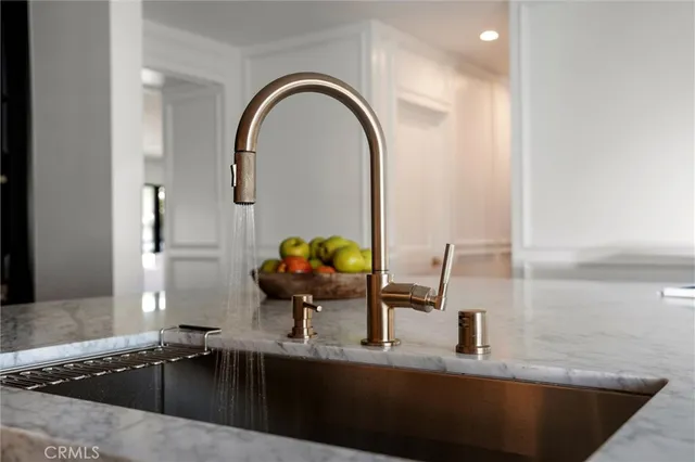 a dining room with furniture window and wooden floor