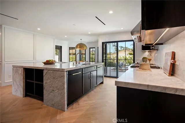 a bathroom with a granite countertop toilet and a shower
