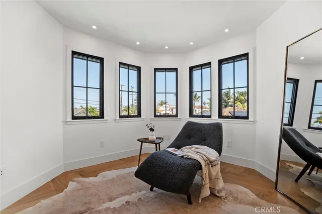 a view of a patio with dining table and chairs