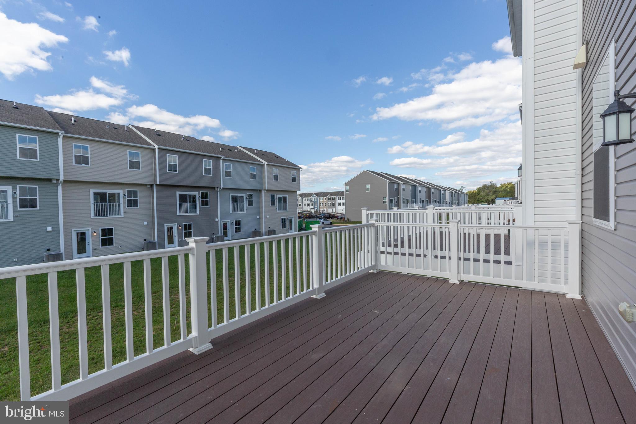 158 Cooperage Road Inwood, WV 25428 - Photo 13 of 25 a view of a wooden deck and city view