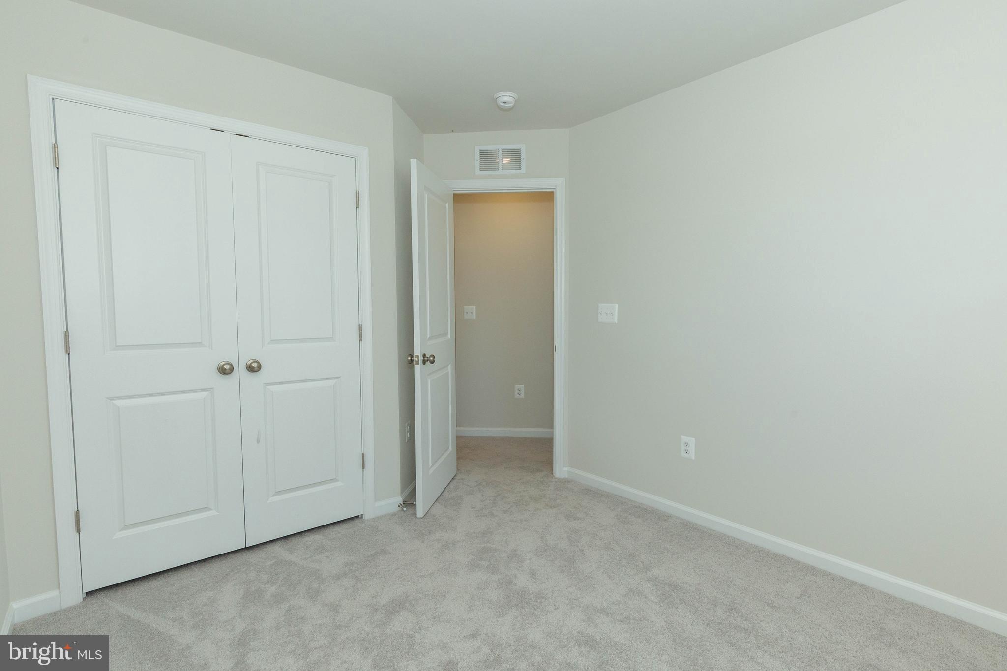 158 Cooperage Road Inwood, WV 25428 - Photo 16 of 25 an empty room with closet area