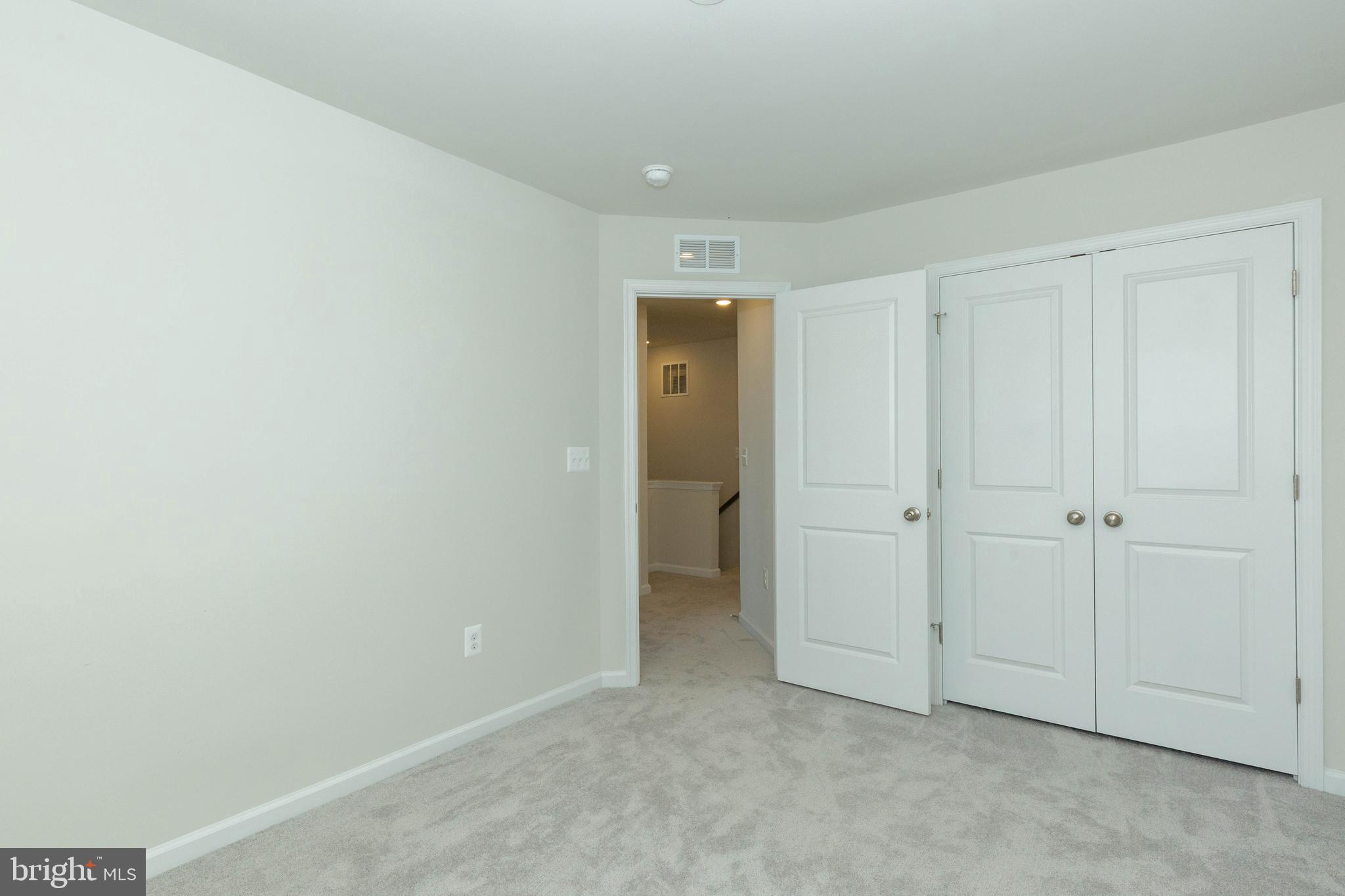 158 Cooperage Road Inwood, WV 25428 - Photo 19 of 25 a view of an empty room and closet area