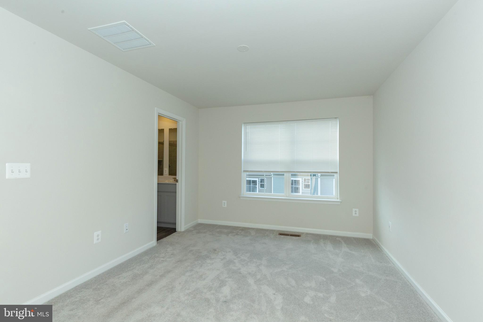 158 Cooperage Road Inwood, WV 25428 - Photo 23 of 25 an empty room with a window