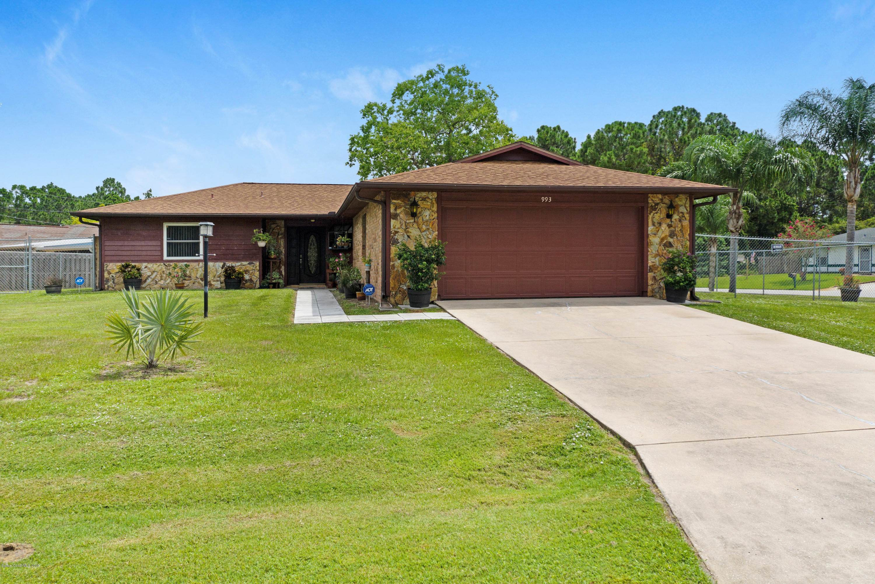 993 Cherokee Road Southeast Palm Bay, FL 32909 - Photo 2 of 35 2 Car Garage