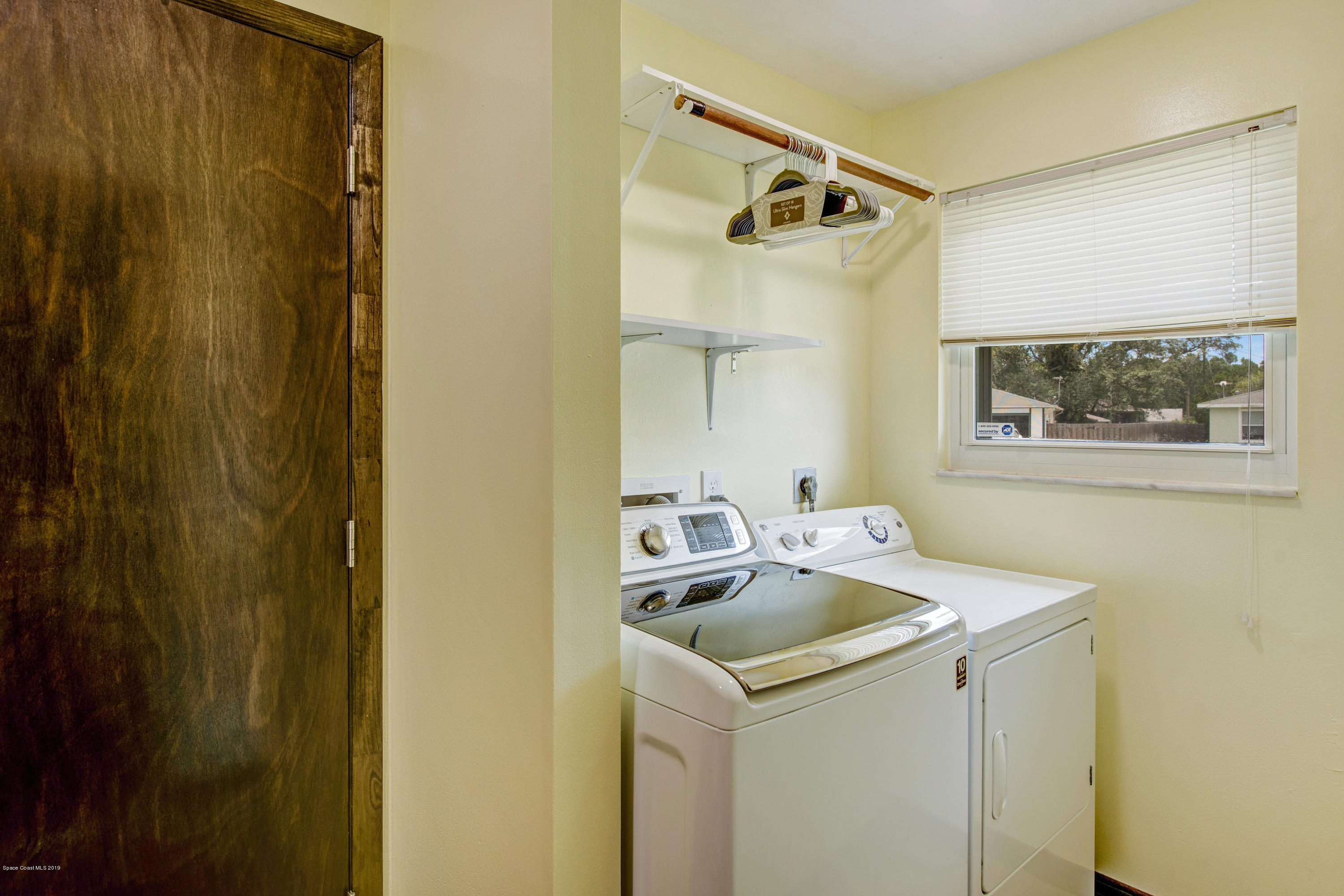 993 Cherokee Road Southeast Palm Bay, FL 32909 - Photo 21 of 35 Laundry Room