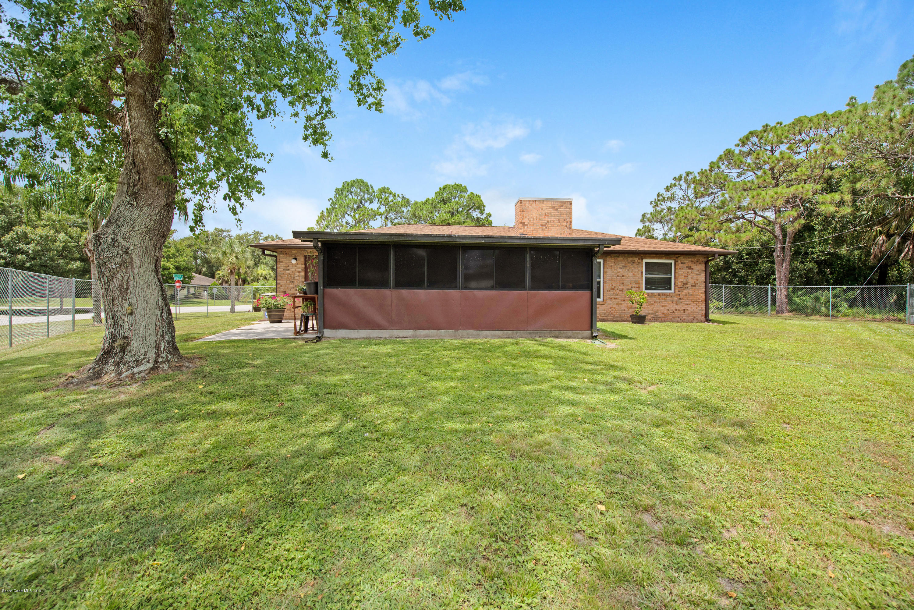 993 Cherokee Road Southeast Palm Bay, FL 32909 - Photo 23 of 35 All Season Patio