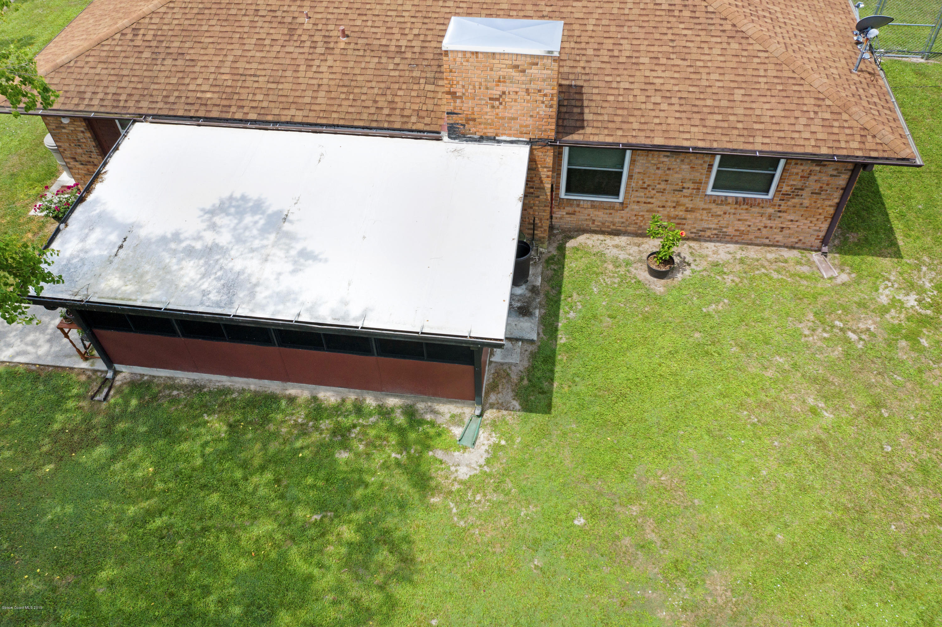 993 Cherokee Road Southeast Palm Bay, FL 32909 - Photo 33 of 35 Over Head Patio
