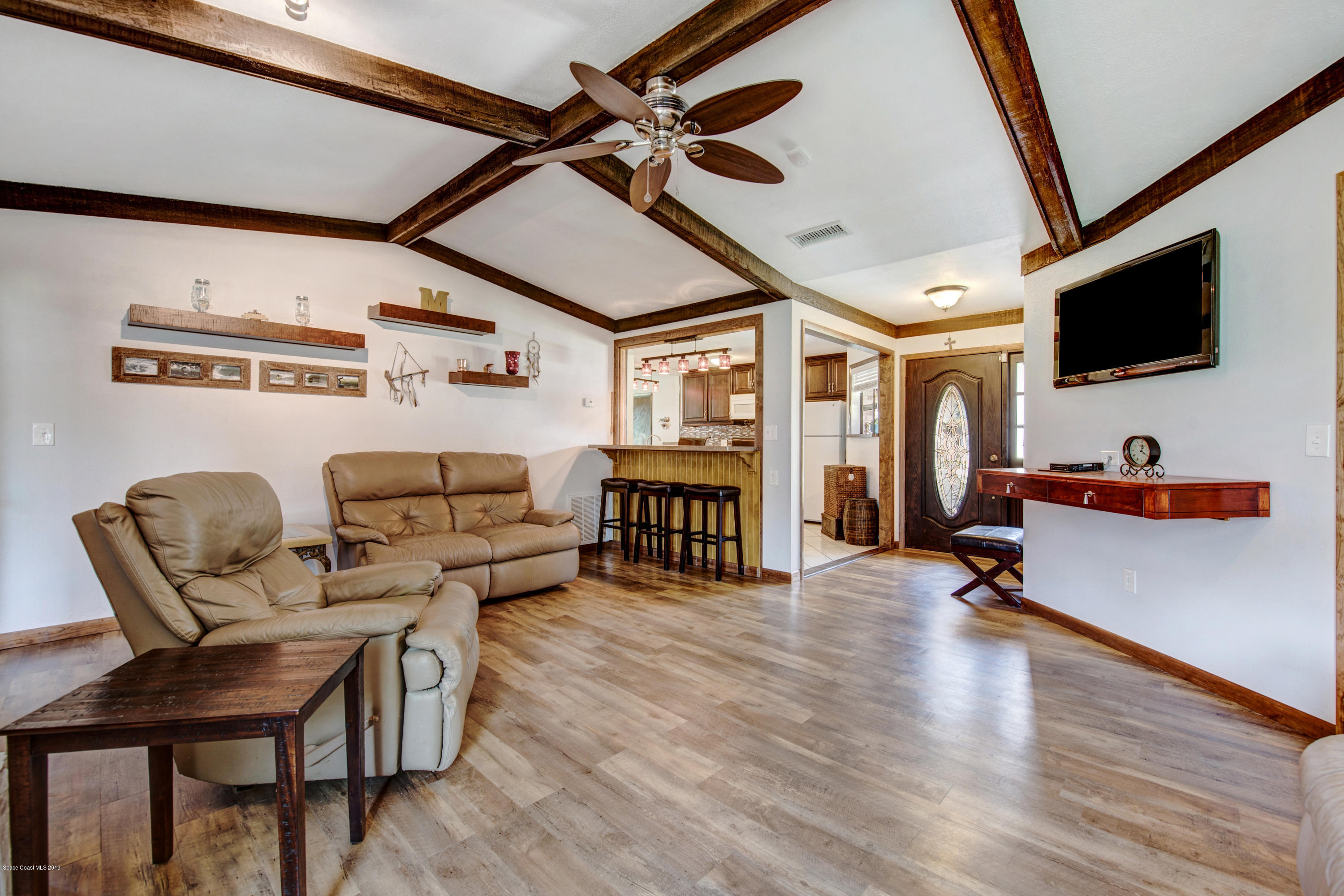 993 Cherokee Road Southeast Palm Bay, FL 32909 - Photo 8 of 35 Entry to Family Room