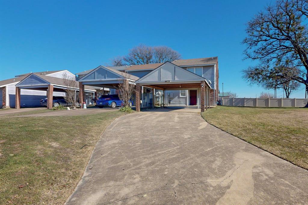 1777 Westerham Drive Dallas, TX 75232 - Photo 1 of 1 a view of a house with large space and a car park front of house