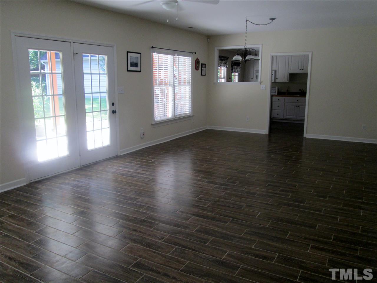 1654 Hayes Road Creedmoor, NC 27522 - Photo 17 of 25 Large Family room in the Basement, new flooring