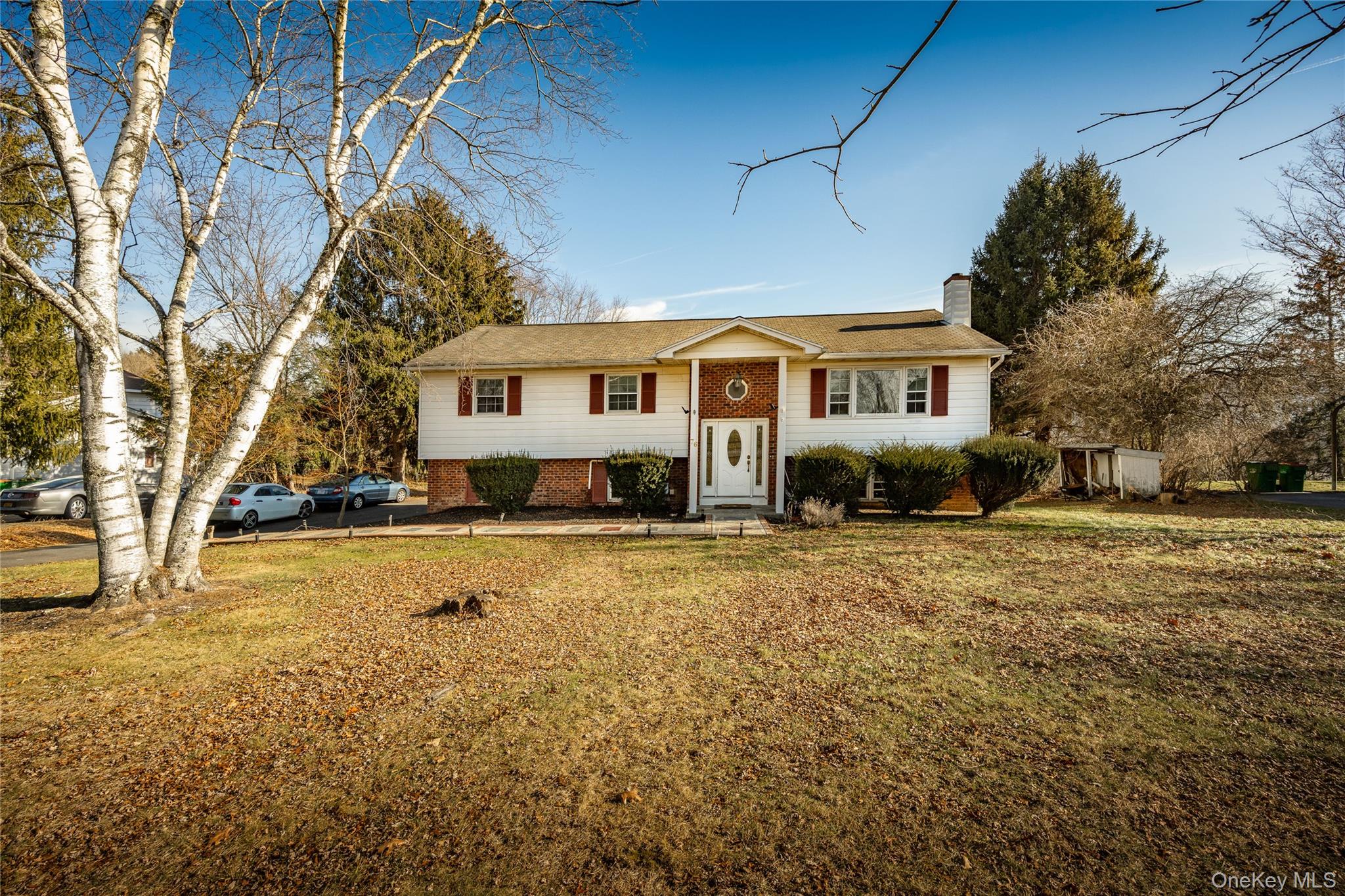 76 Derick Drive Fishkill, NY 12524 - Photo 1 of 27 a front view of a house with a yard