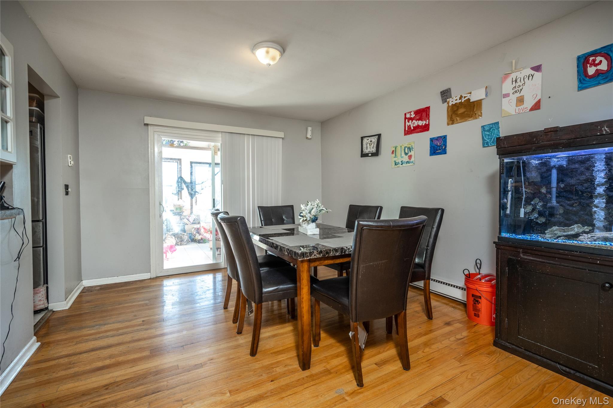 76 Derick Drive Fishkill, NY 12524 - Photo 11 of 27 a view of a dining room with furniture and wooden floor