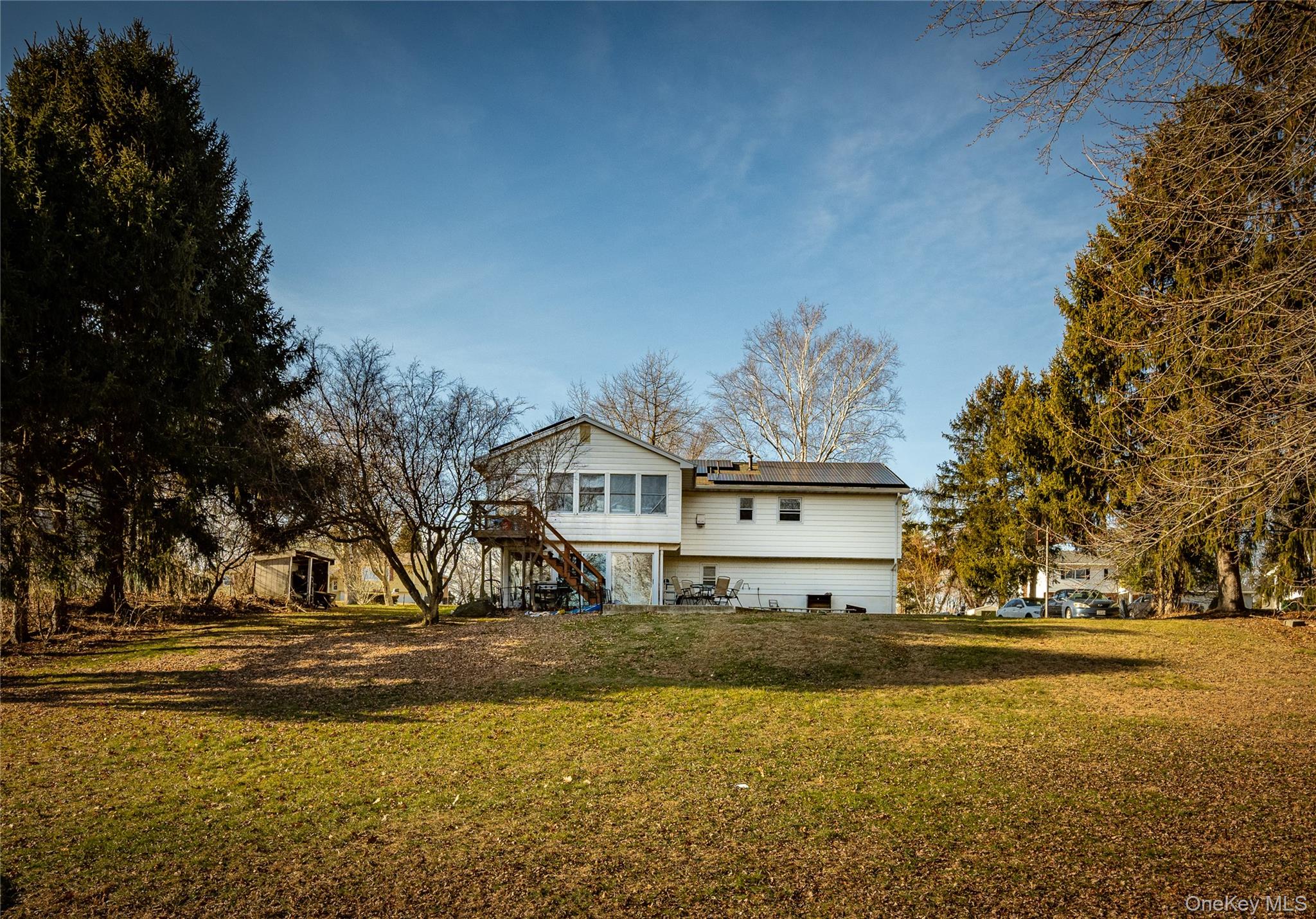 76 Derick Drive Fishkill, NY 12524 - Photo 3 of 27 a view of a house with a ocean view