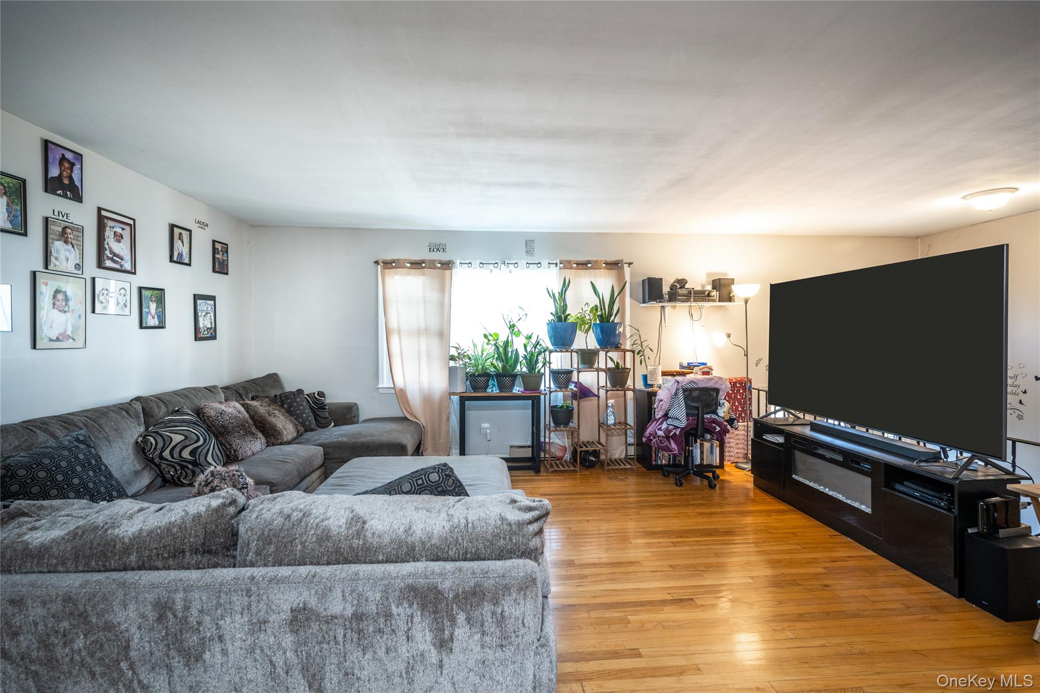 76 Derick Drive Fishkill, NY 12524 - Photo 7 of 27 a living room with furniture and a flat screen tv