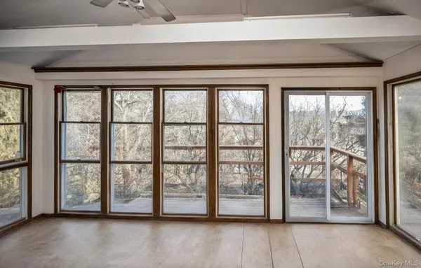 a view of a room with a large window