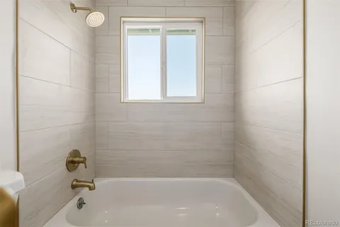 a bathroom with a bathtub
