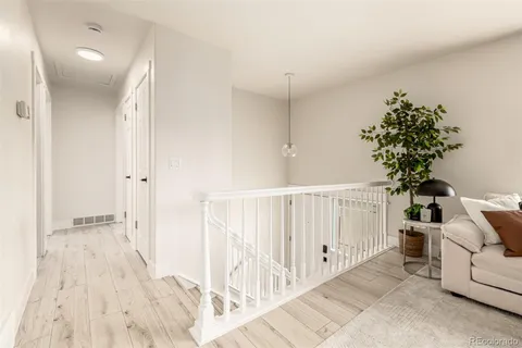 a view of entryway with wooden floor