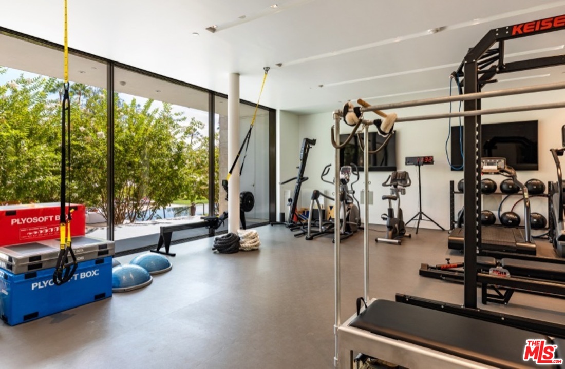 911 Foothill Road Beverly Hills, CA 90210 - Photo 15 of 21 a view of a room with gym equipment