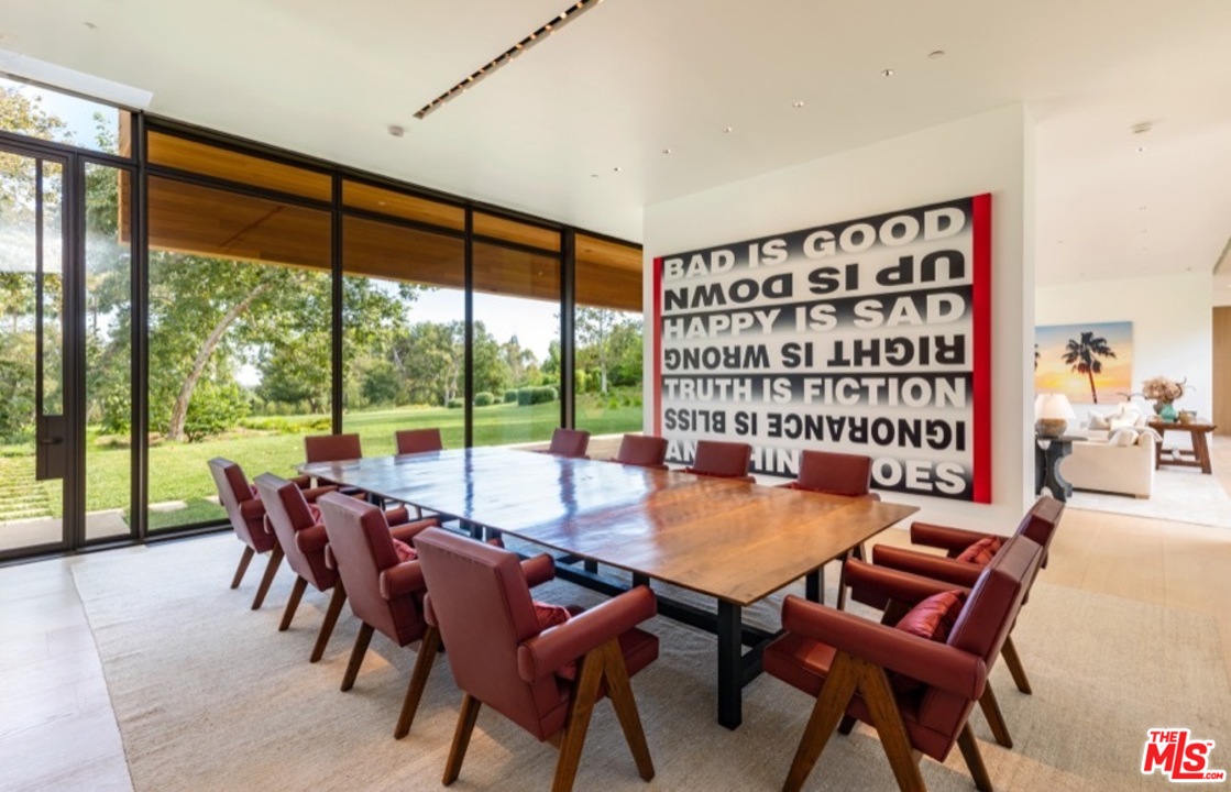 911 Foothill Road Beverly Hills, CA 90210 - Photo 9 of 21 a view of a dining room with furniture window and outside view