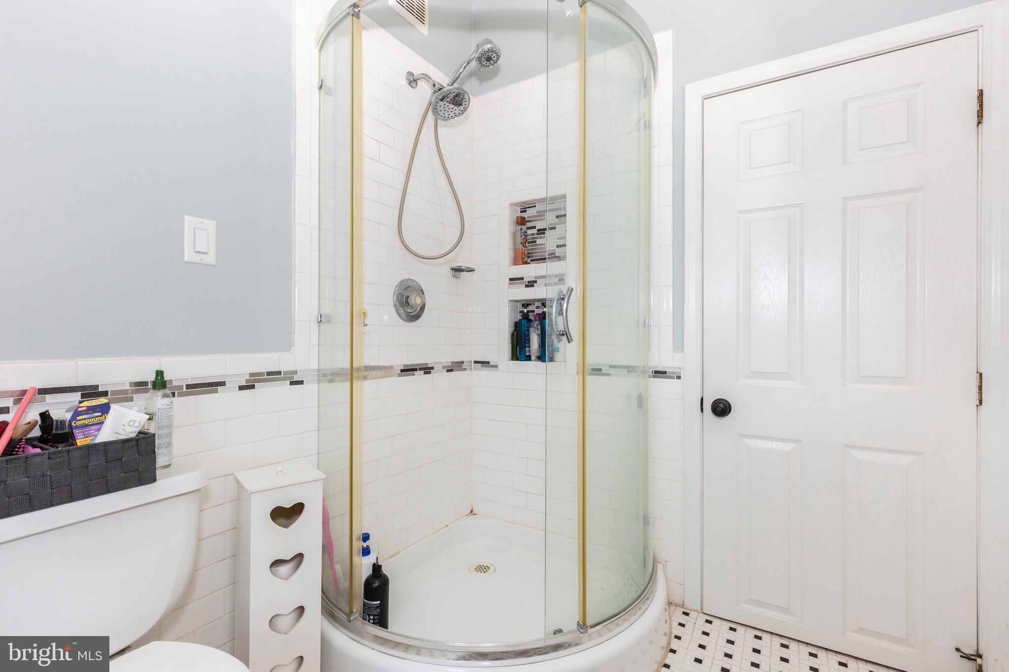 1845 Benson Road Westminster, MD 21158 - Photo 20 of 62 a bathroom with a granite countertop shower and a toilet