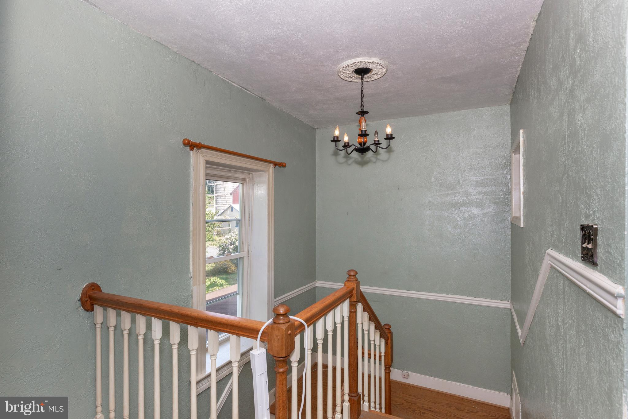 1845 Benson Road Westminster, MD 21158 - Photo 31 of 62 a view of a hallway view with hardwood floor