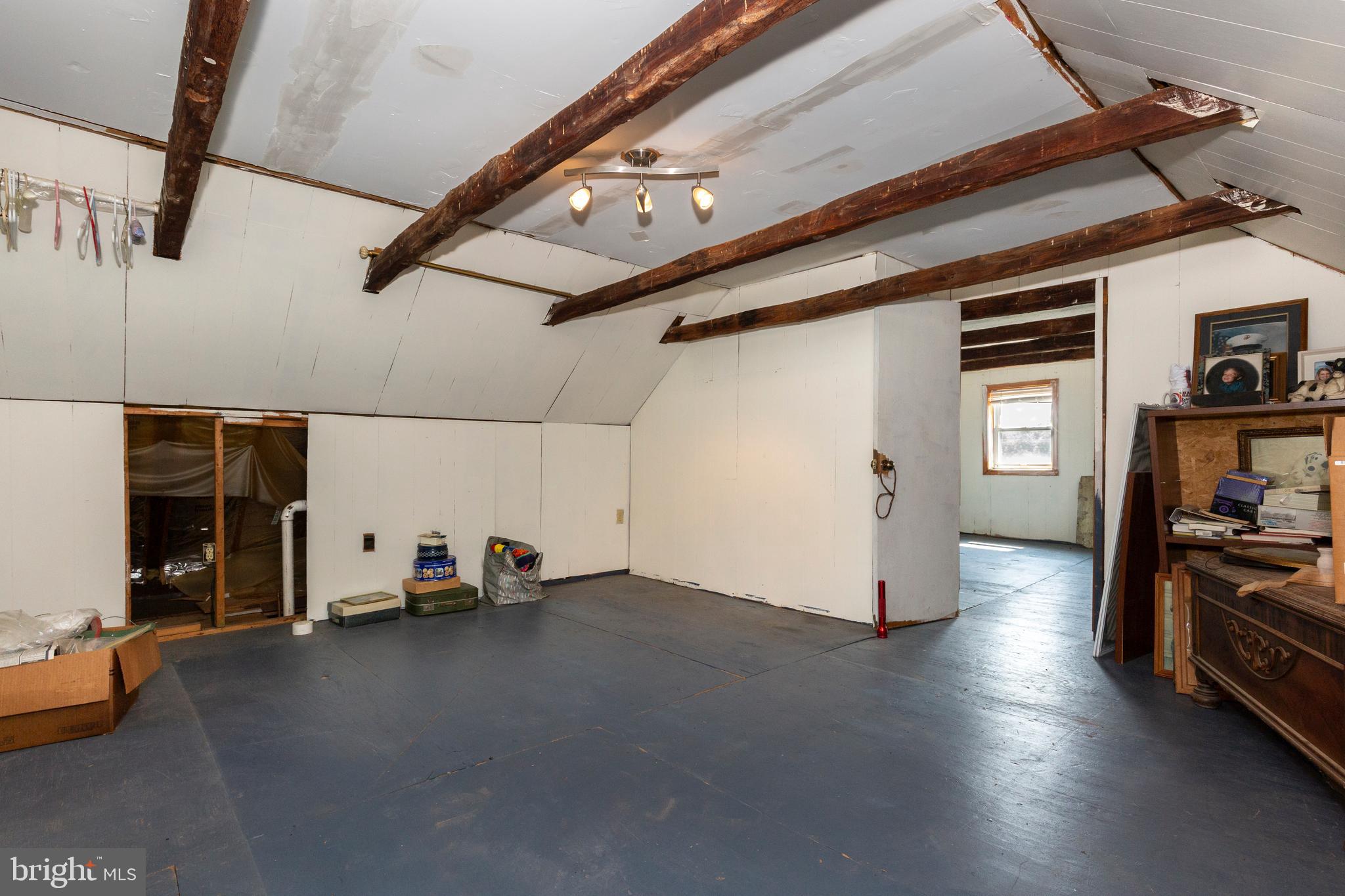 1845 Benson Road Westminster, MD 21158 - Photo 37 of 62 a view of empty room with wooden floor