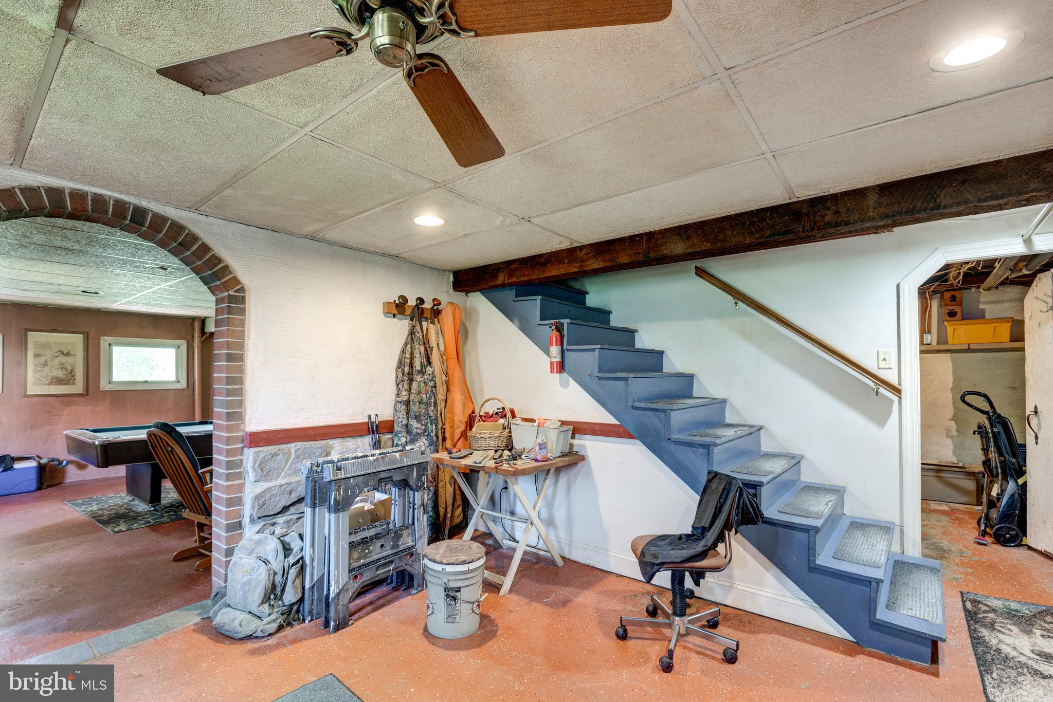 1845 Benson Road Westminster, MD 21158 - Photo 39 of 62 a view of a livingroom with furniture and staircase