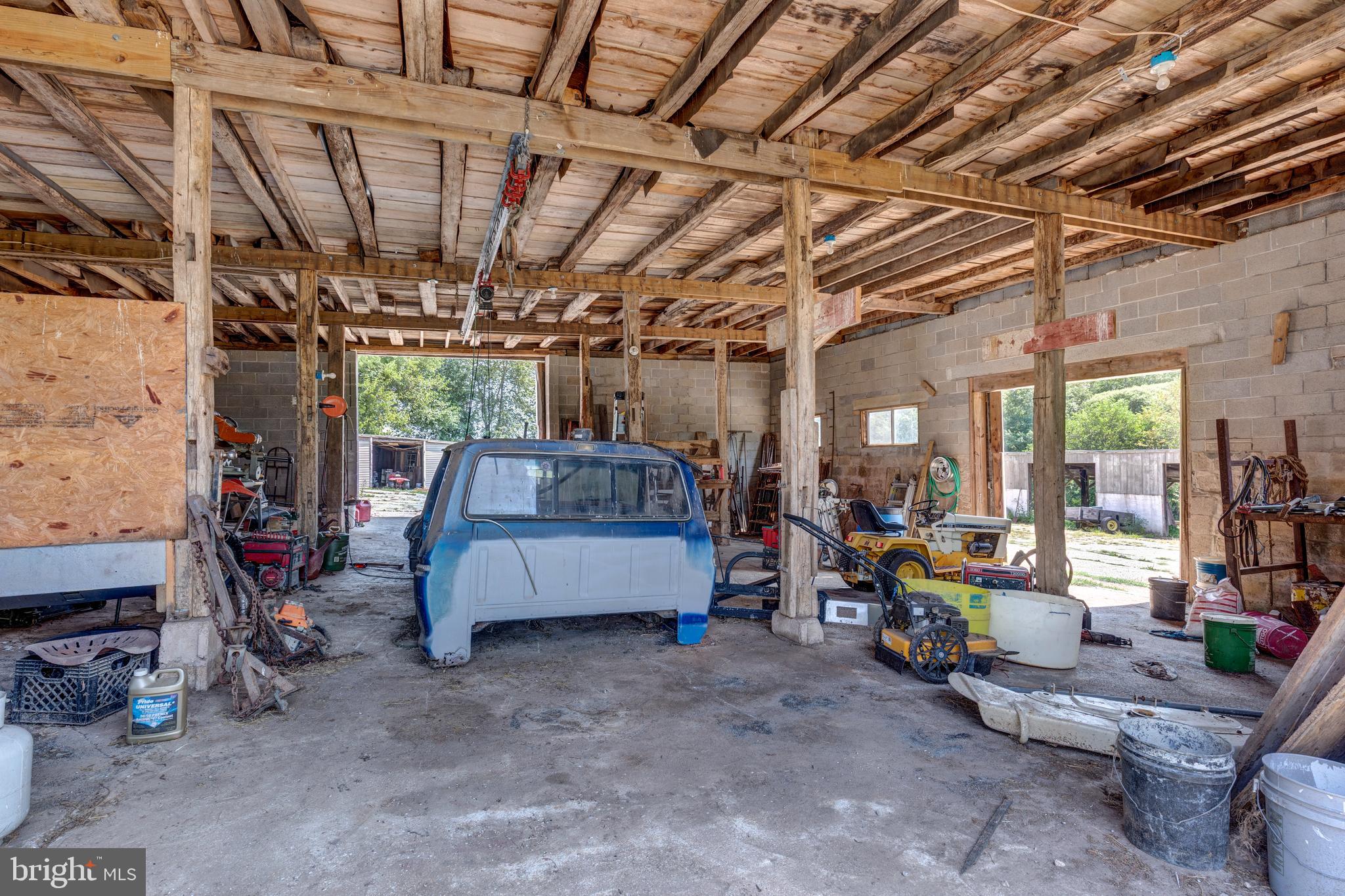 1845 Benson Road Westminster, MD 21158 - Photo 52 of 62 a view of a garage with a table and chairs