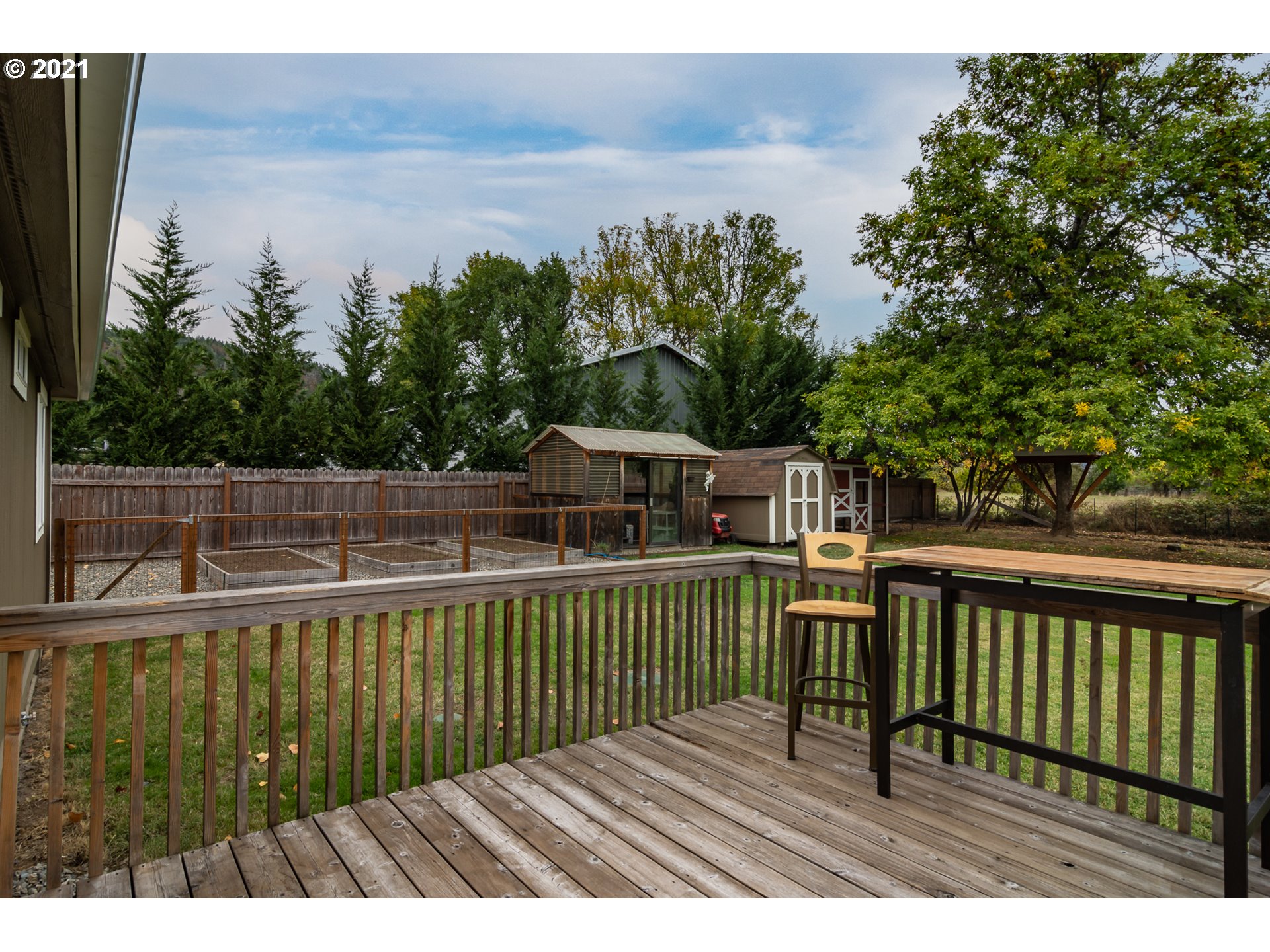 151 North Side Road Sutherlin, OR 97479 - Photo 18 of 27 a view of a balcony with wooden floor and lake view