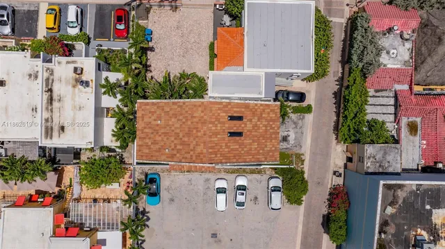 a kitchen with stainless steel appliances a refrigerator sink and microwave