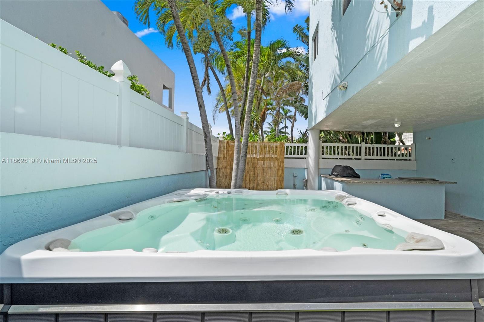 311 North Surf Road, Unit 311 Hollywood, FL 33019 - Photo 31 of 68 a bathroom with a bathtub and a sink