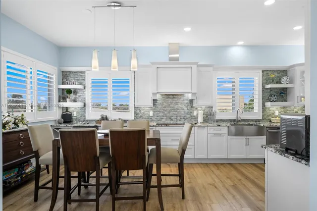 a bathroom with a tub and a shower