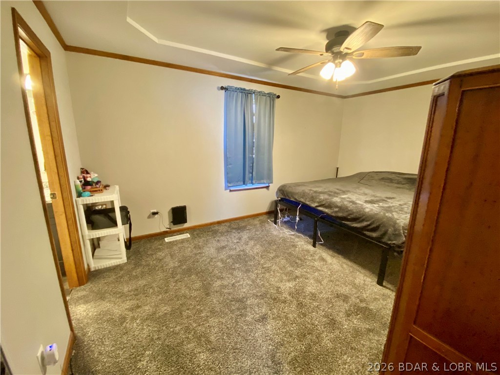 12420 County Road Holts Summit, MO 65043 - Photo 19 of 36 Primary Bedroom