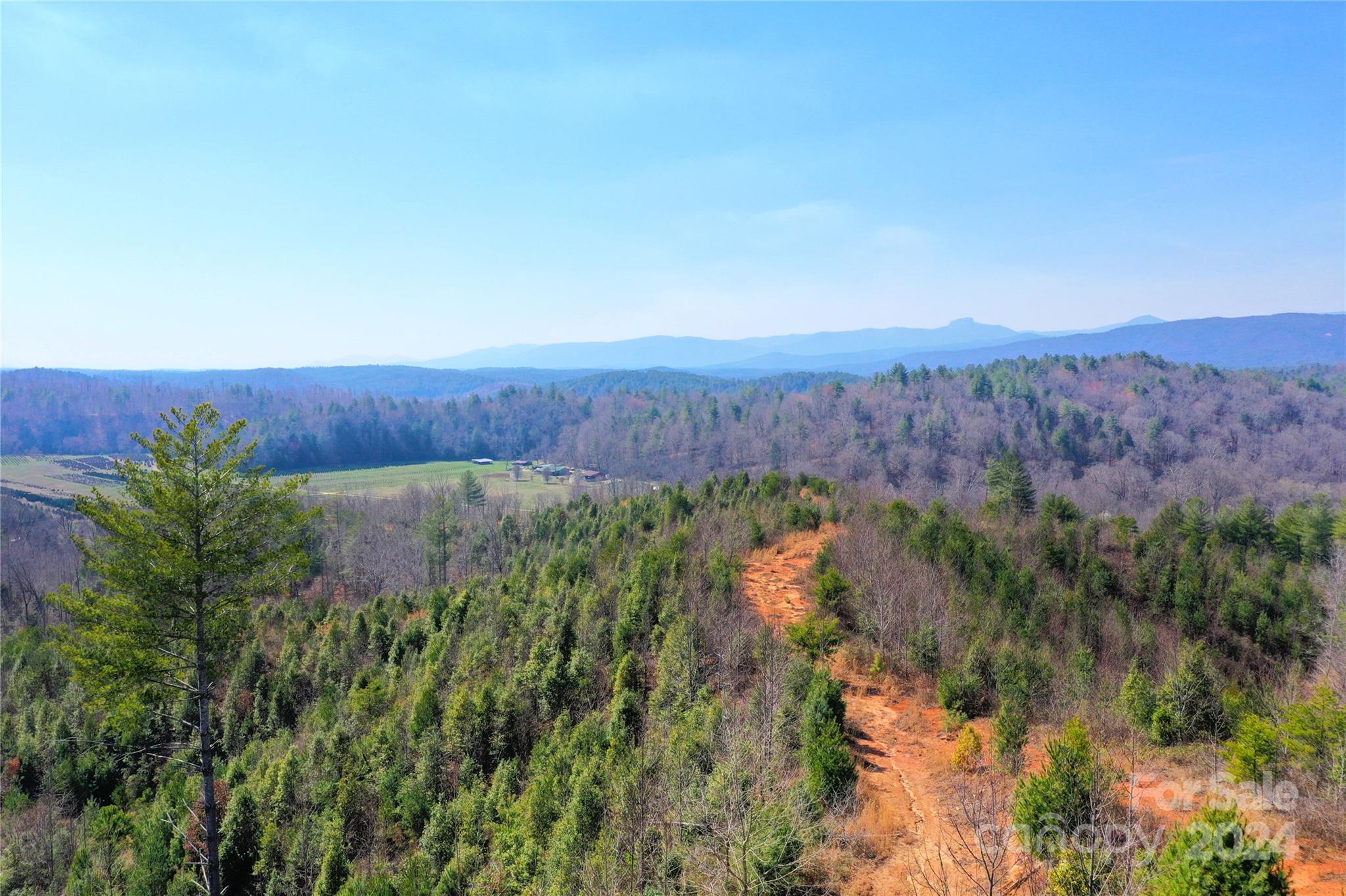 0 Playmore Beach Road Lenoir, NC 28645 - Photo 4 of 16 an aerial view of a house and mountain view