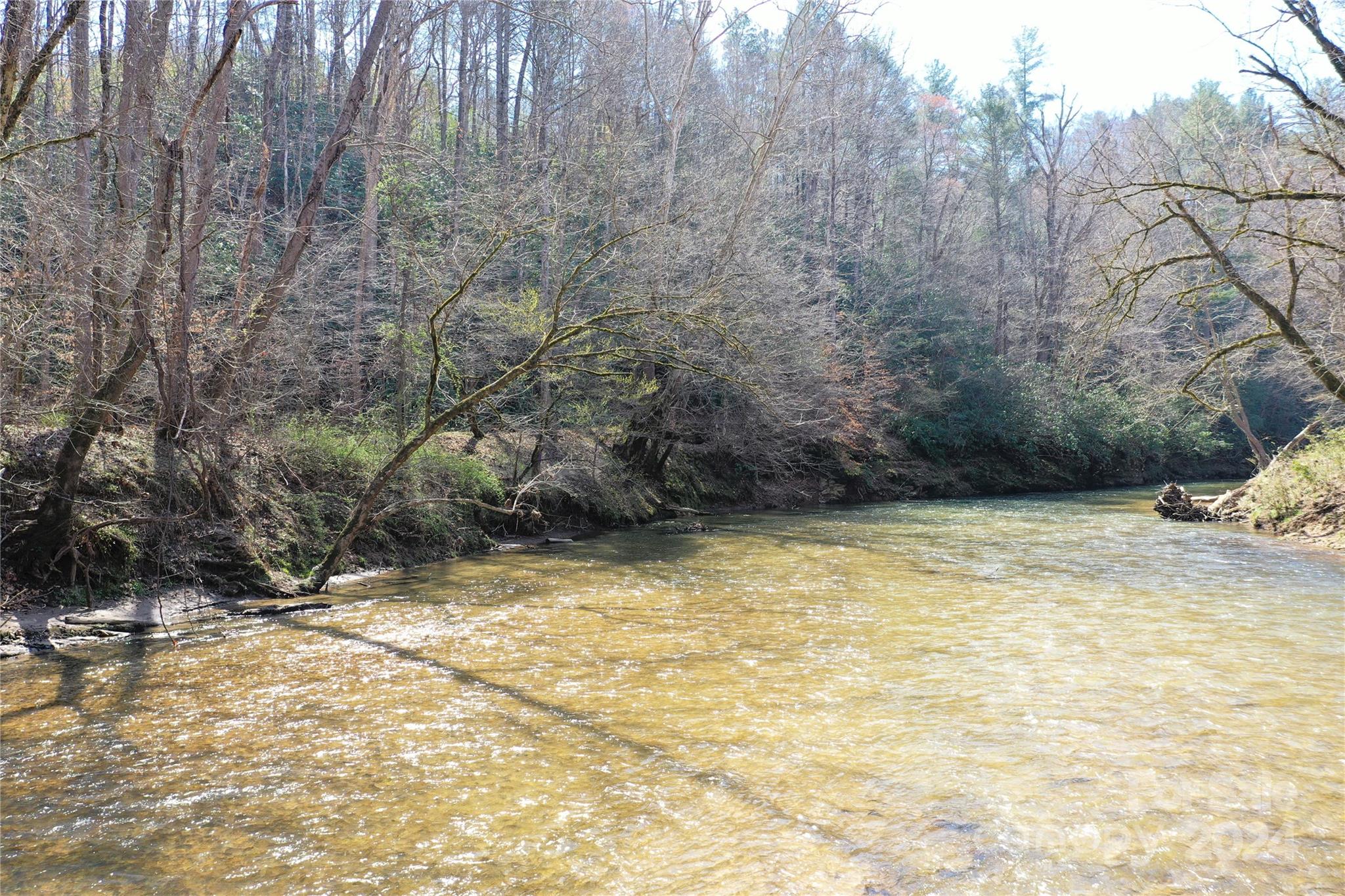 0 Playmore Beach Road Lenoir, NC 28645 - Photo 7 of 16 a view of a yard with a barn