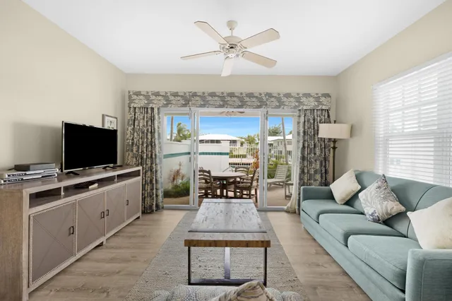 a view of a swimming pool with an outdoor space and seating area