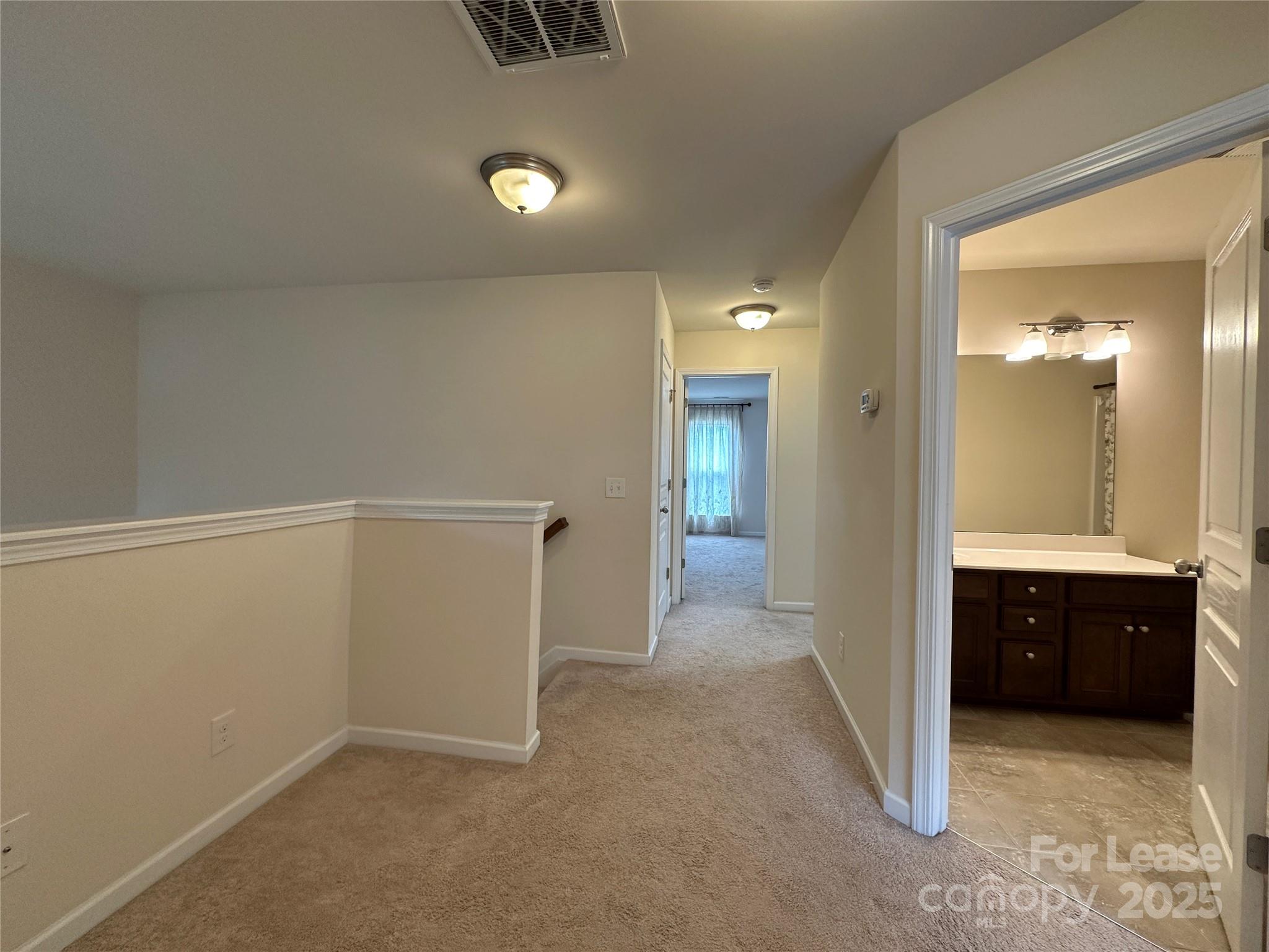 6516 Portland Rose Lane Charlotte, NC 28210 - Photo 11 of 22 wooden floor and cabinet in a room