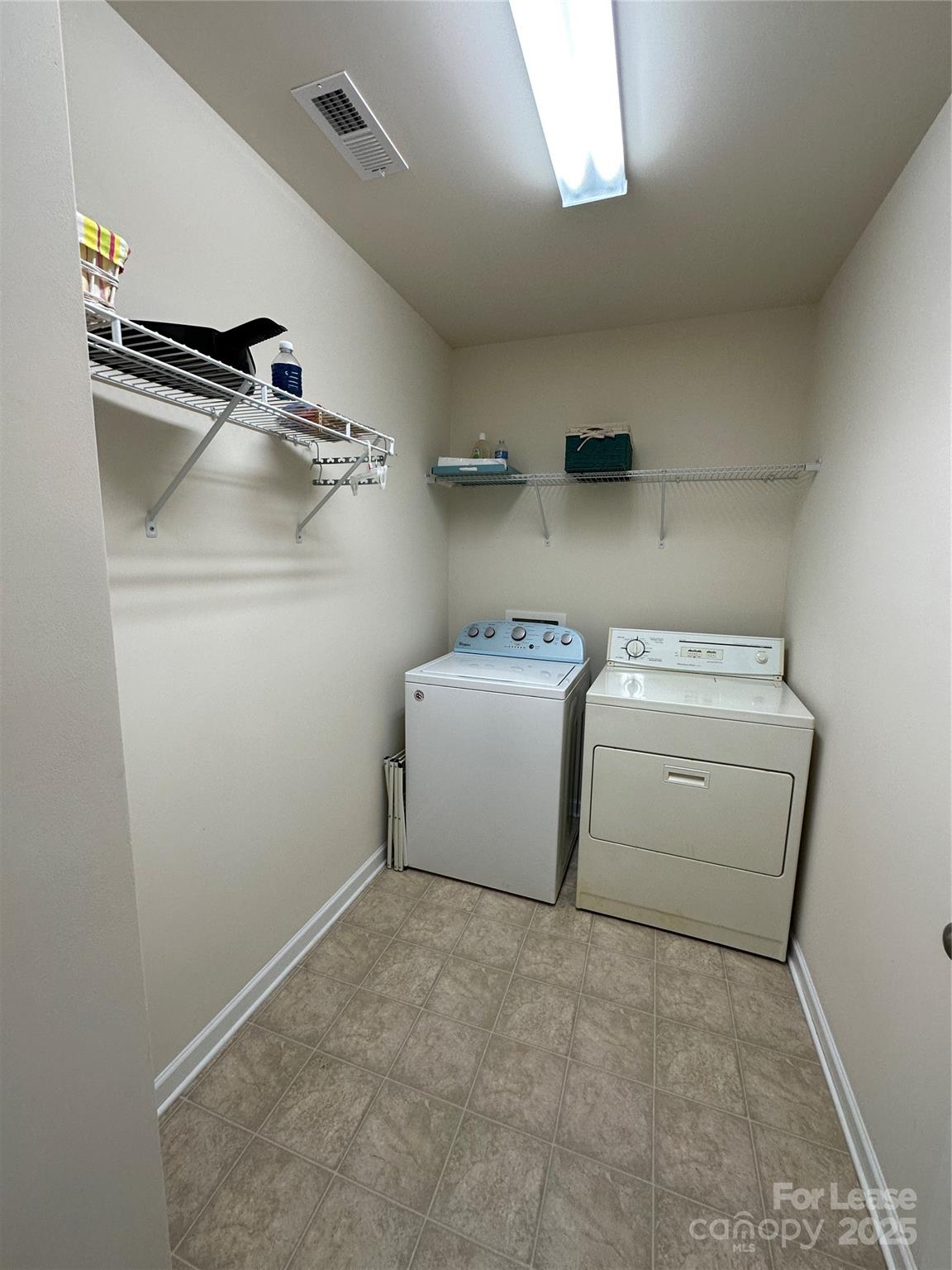 6516 Portland Rose Lane Charlotte, NC 28210 - Photo 13 of 22 a utility room with dryer and washer