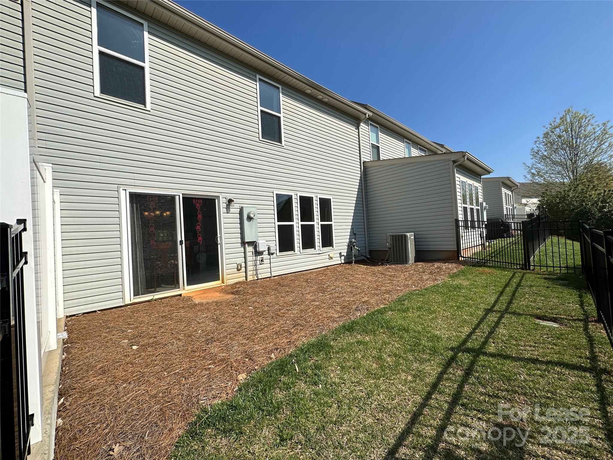 6516 Portland Rose Lane Charlotte, NC 28210 - Photo 21 of 22 a view of a backyard of the house