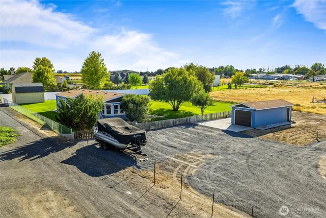 a park view with a bench and city view