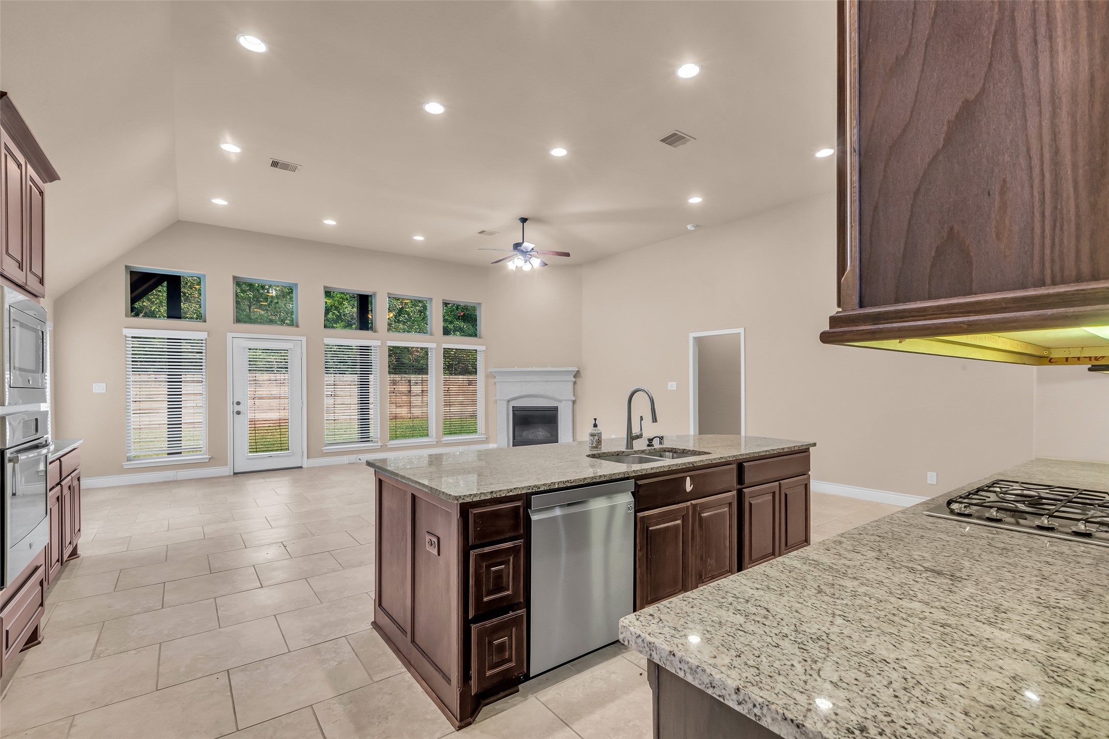 27946 Emory Cove Drive Spring, TX 77386 - Photo 12 of 25 a kitchen with a stove and a sink
