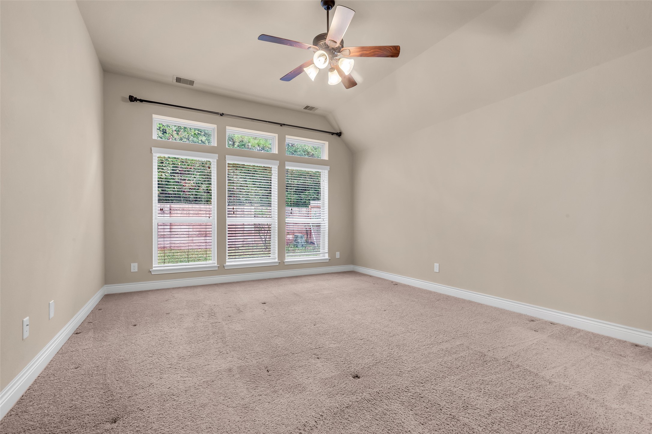 27946 Emory Cove Drive Spring, TX 77386 - Photo 16 of 25 a view of an empty room with a window