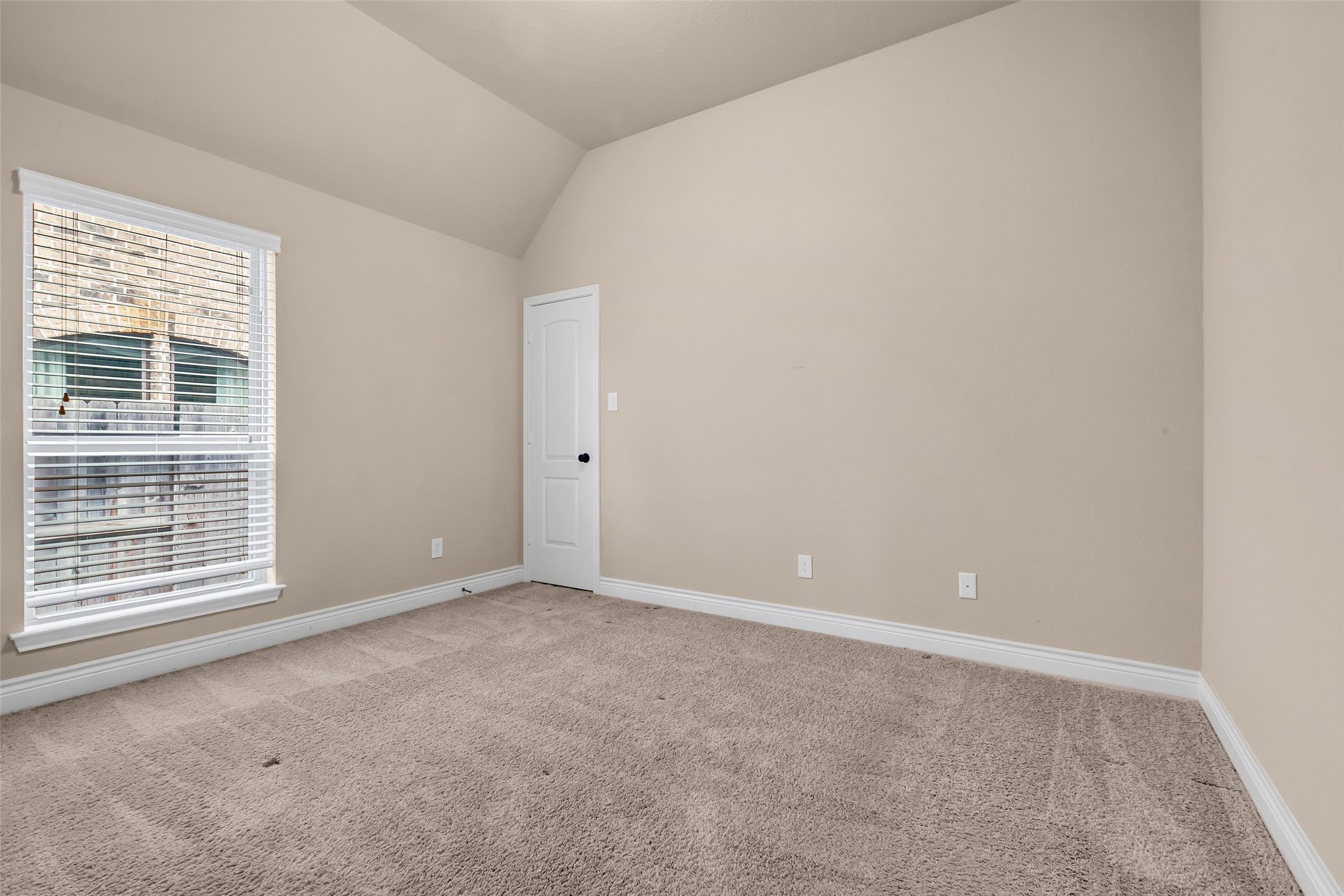 27946 Emory Cove Drive Spring, TX 77386 - Photo 20 of 25 a view of an empty room with a window